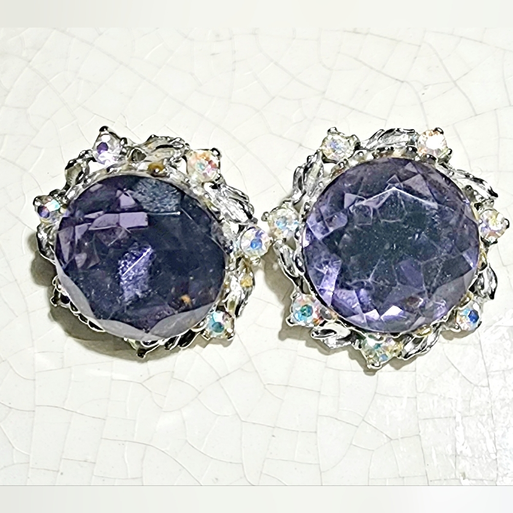 Purple amethyst colored foiled back with Aurora Borealis stone clip on earrings
